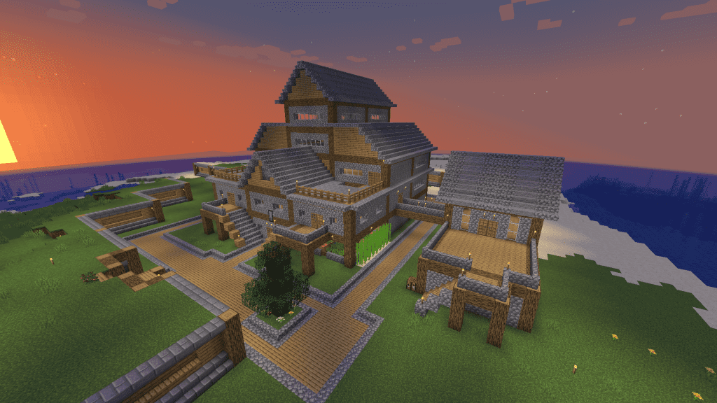 A screenshot from Minecraft, showing a large rustic house.