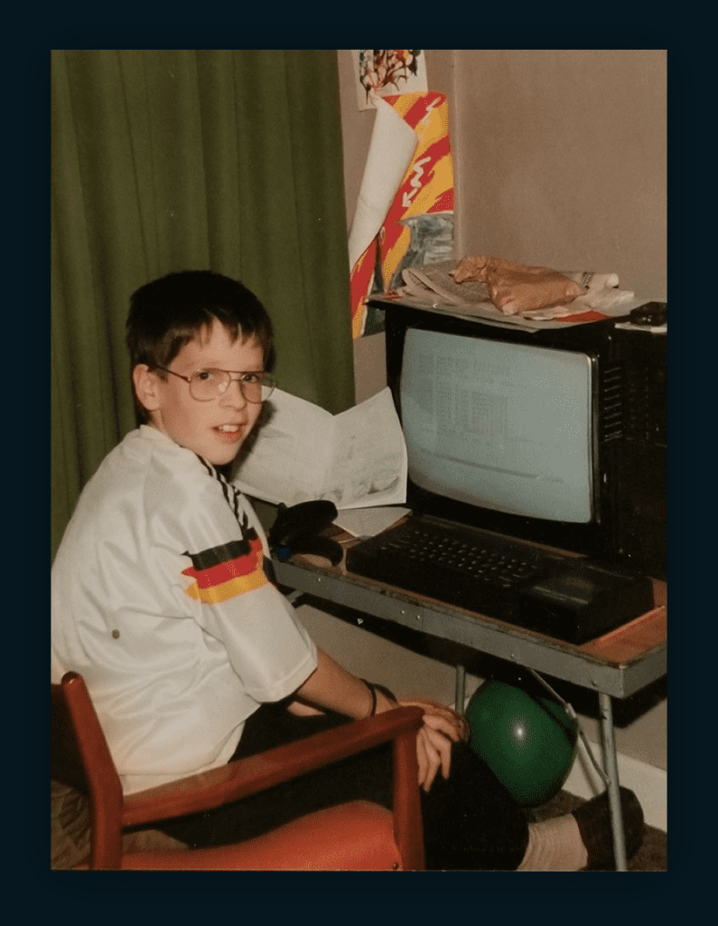 A photo of Shane as a child sitting in front of a ZX Spectrum.